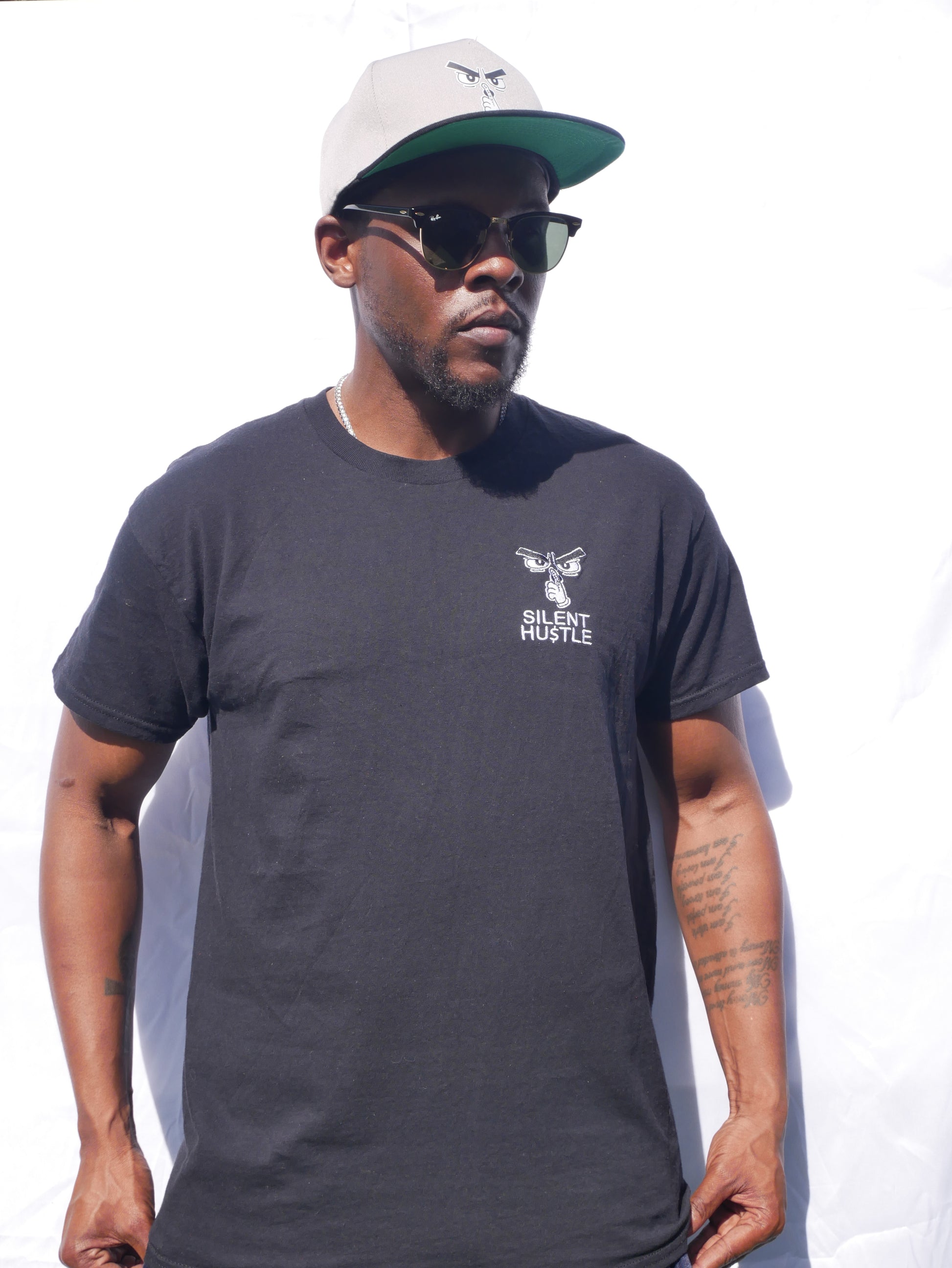 Small embroidered Silent Hustle logo with writing image 2