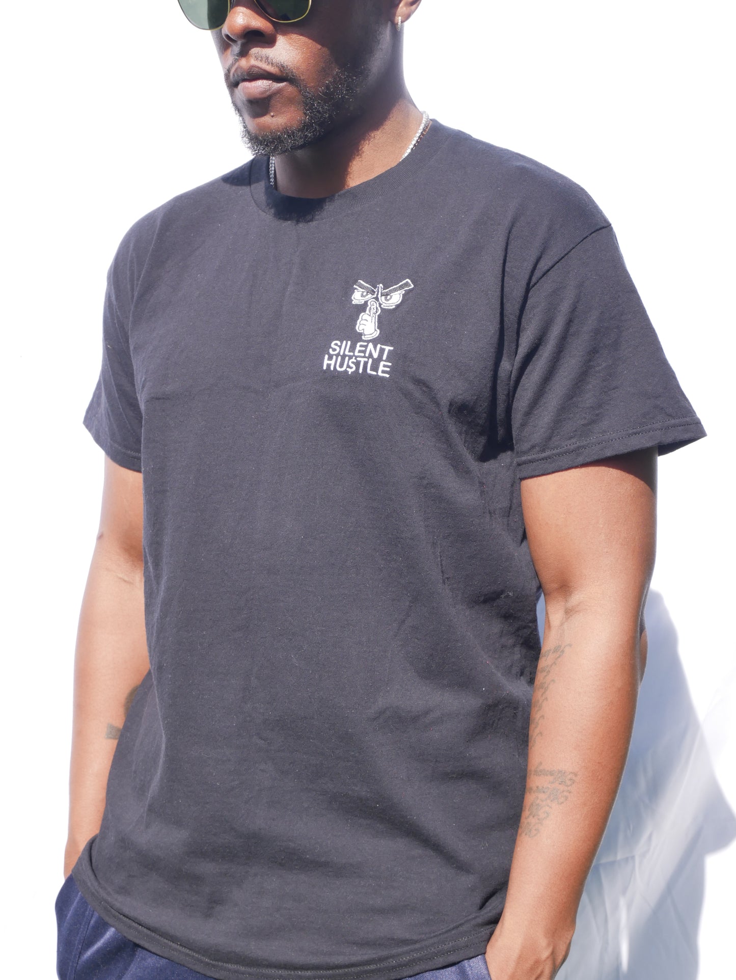 Small embroidered Silent Hustle logo with writing image 0