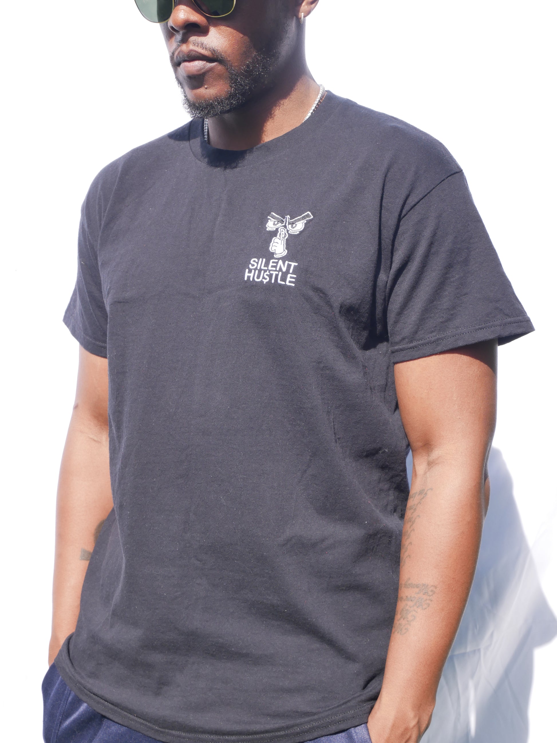 Small embroidered Silent Hustle logo with writing image 0